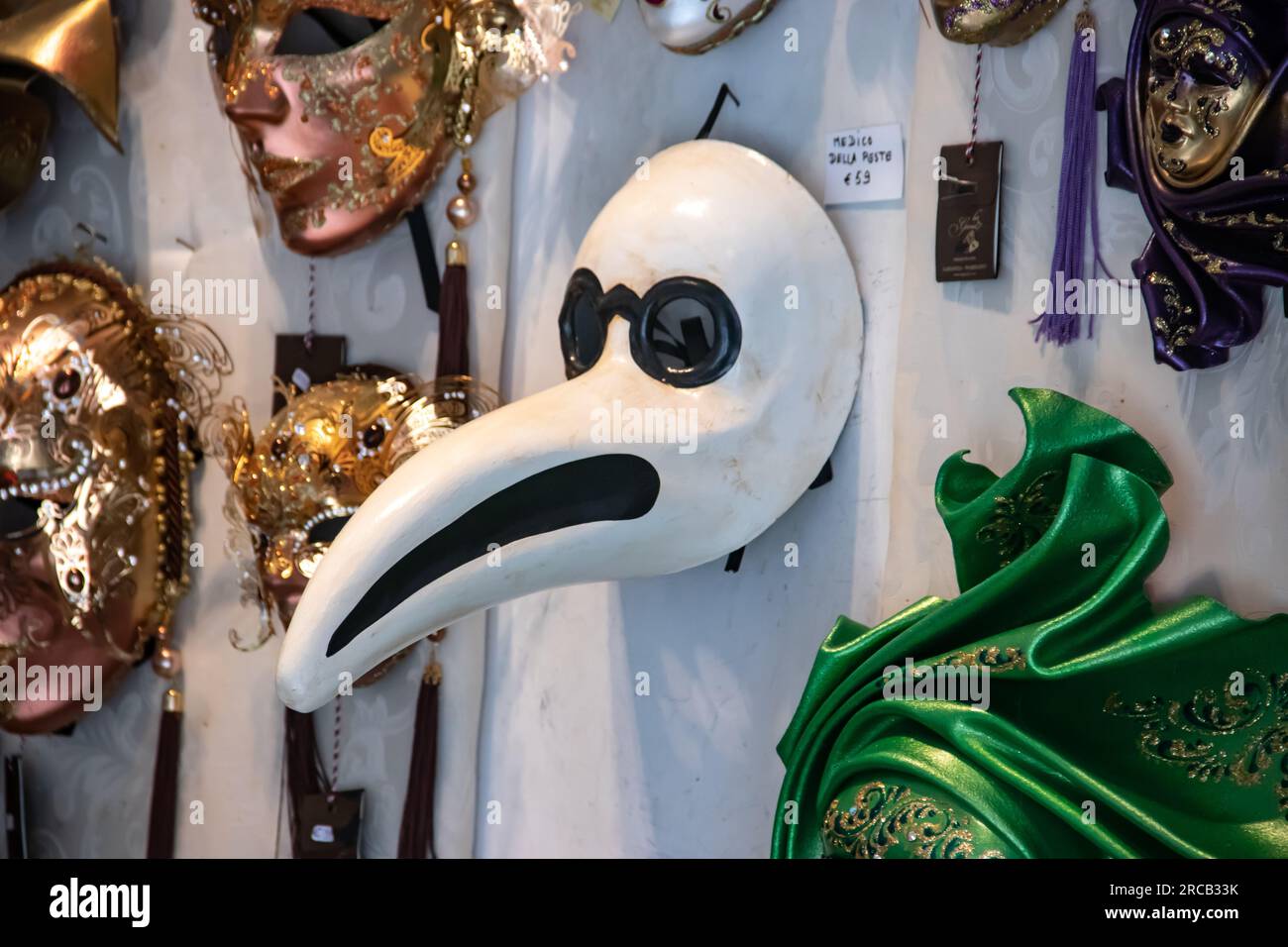 Imaginative Venetian carnival masks collection in a souvenir shop in Venice Stock Photo