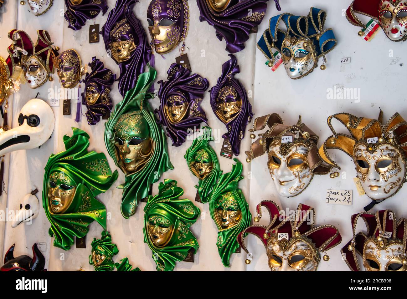 Imaginative Venetian carnival masks collection in a souvenir shop in Venice Stock Photo