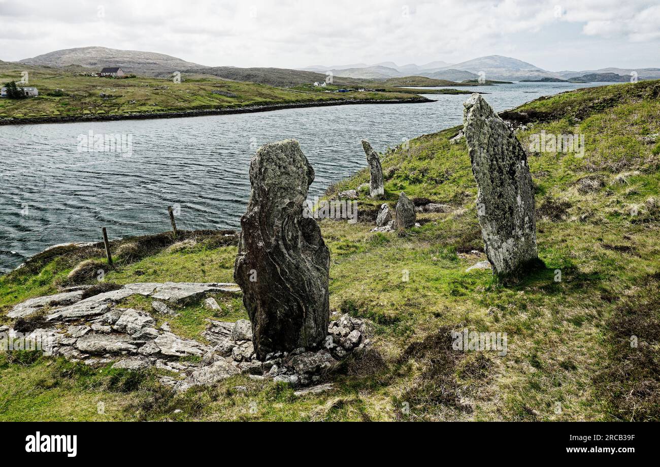 Callanish VIII prehistoric Neolithic stone circle. Isle of Lewis, Outer Hebrides. Semi-circular megalith setting on cliff edge. Aerial looking SW Stock Photo