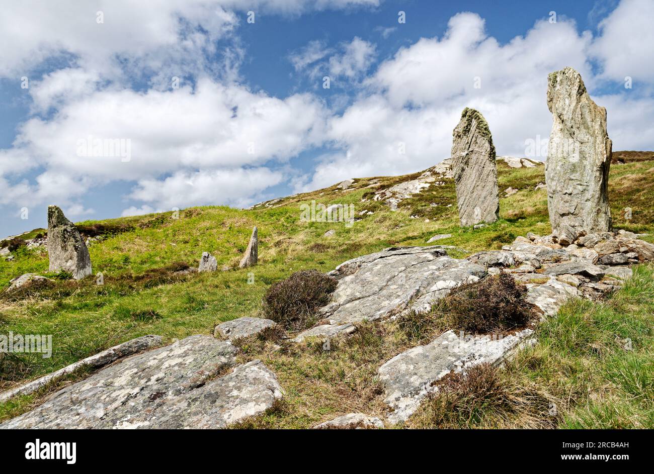 Callanish VIII prehistoric Neolithic stone circle. Isle of Lewis, Outer Hebrides. Semi-circular megalith setting on cliff edge. Aerial looking NW Stock Photo