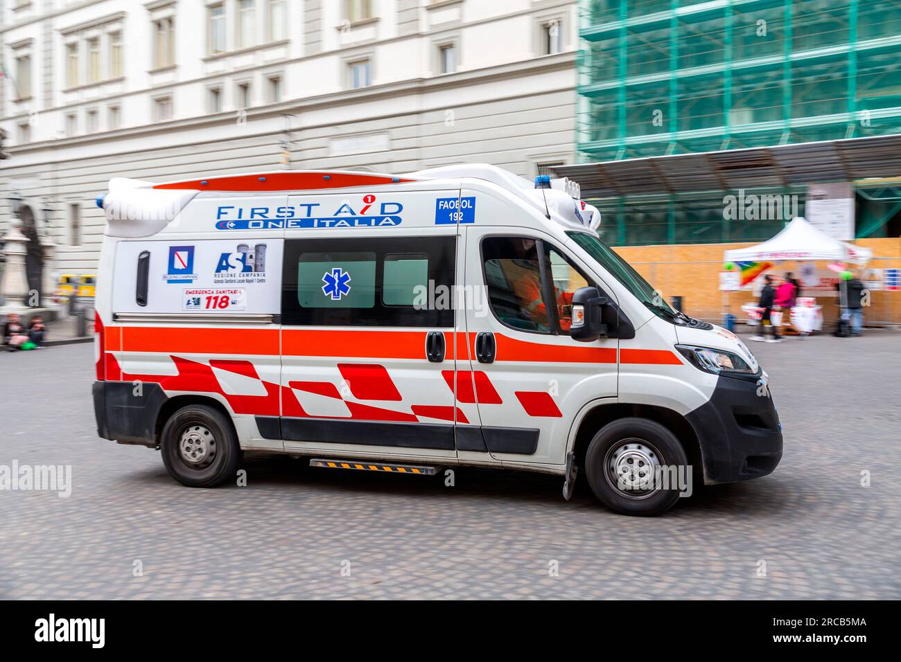 Naples, Italy - April 9, 2022: Italian First Aid Ambulance vehicle on the streets of Naples, Campania, Italy. Stock Photo
