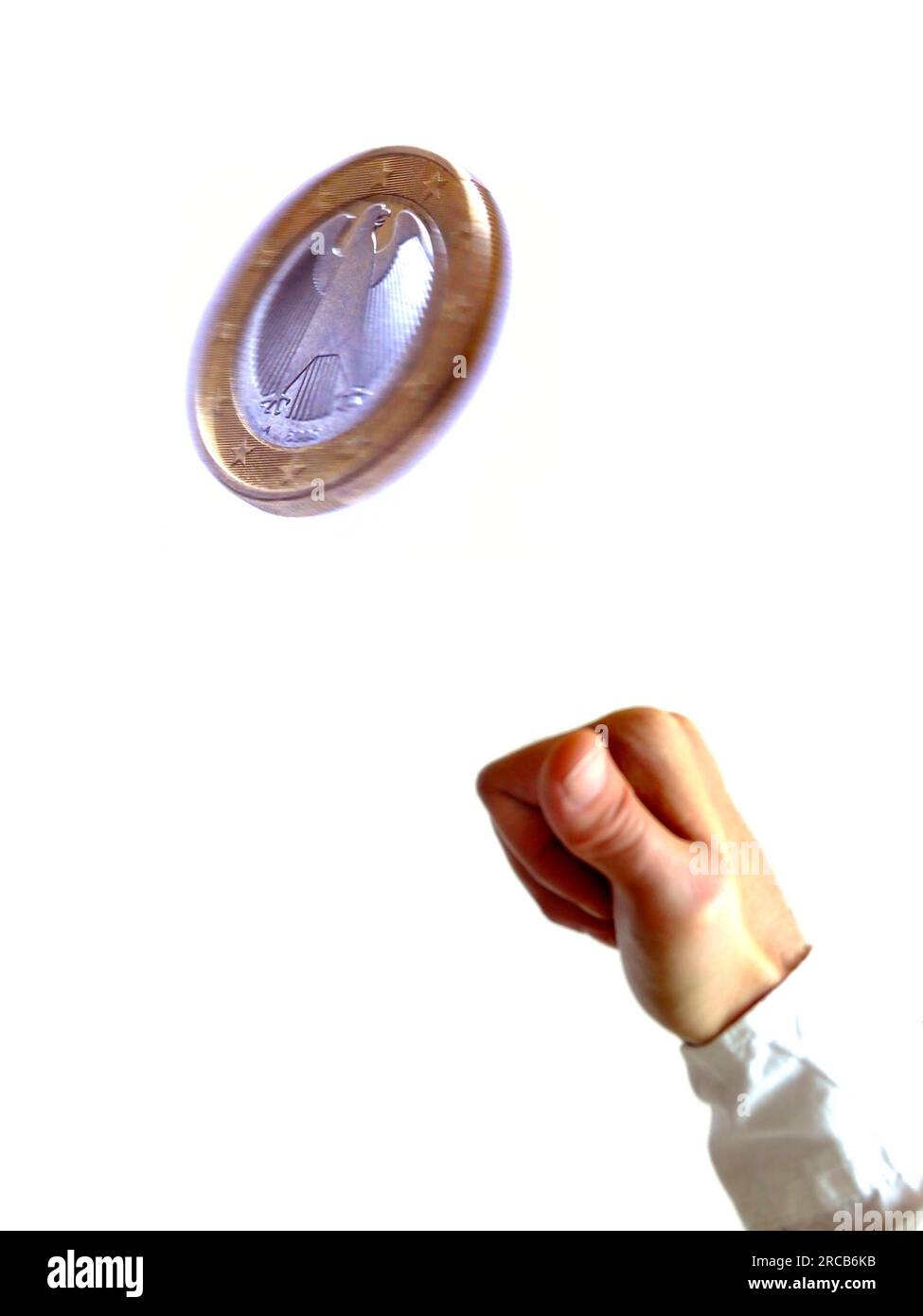 A coin toss Stock Photo