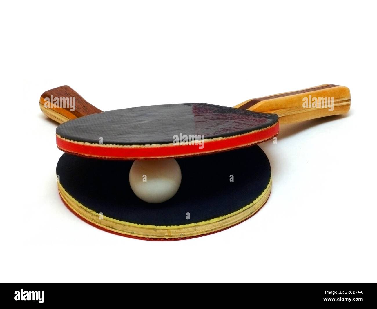 Two table tennis bats and a ball Stock Photo Alamy