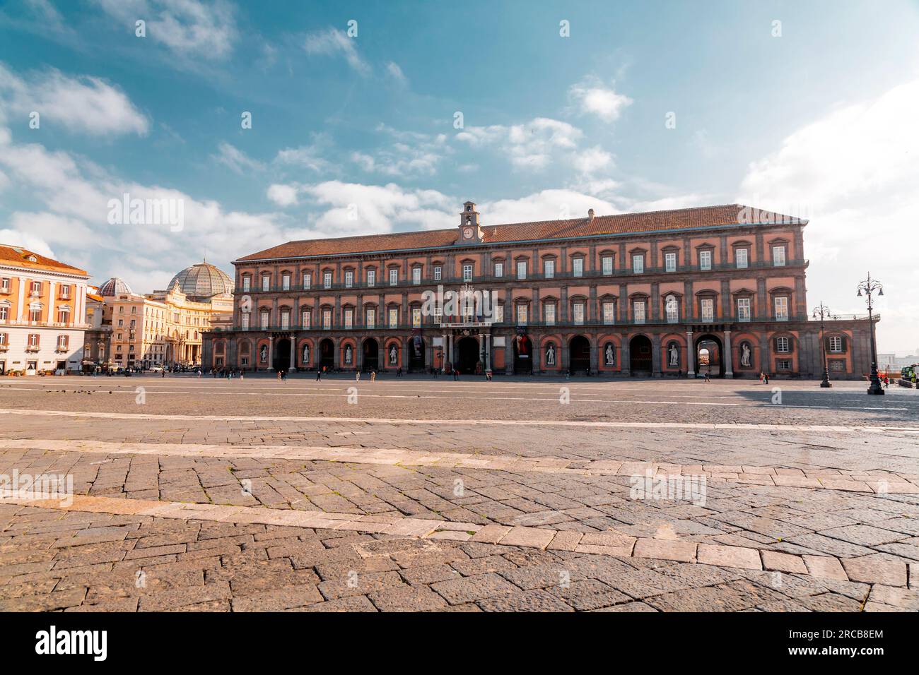 Naples, Italy - April 9, 2022: Exterior view of Palazzi Reale di Napoli, Naples Royal Palace and the National Library building in Naples, Campania, It Stock Photo