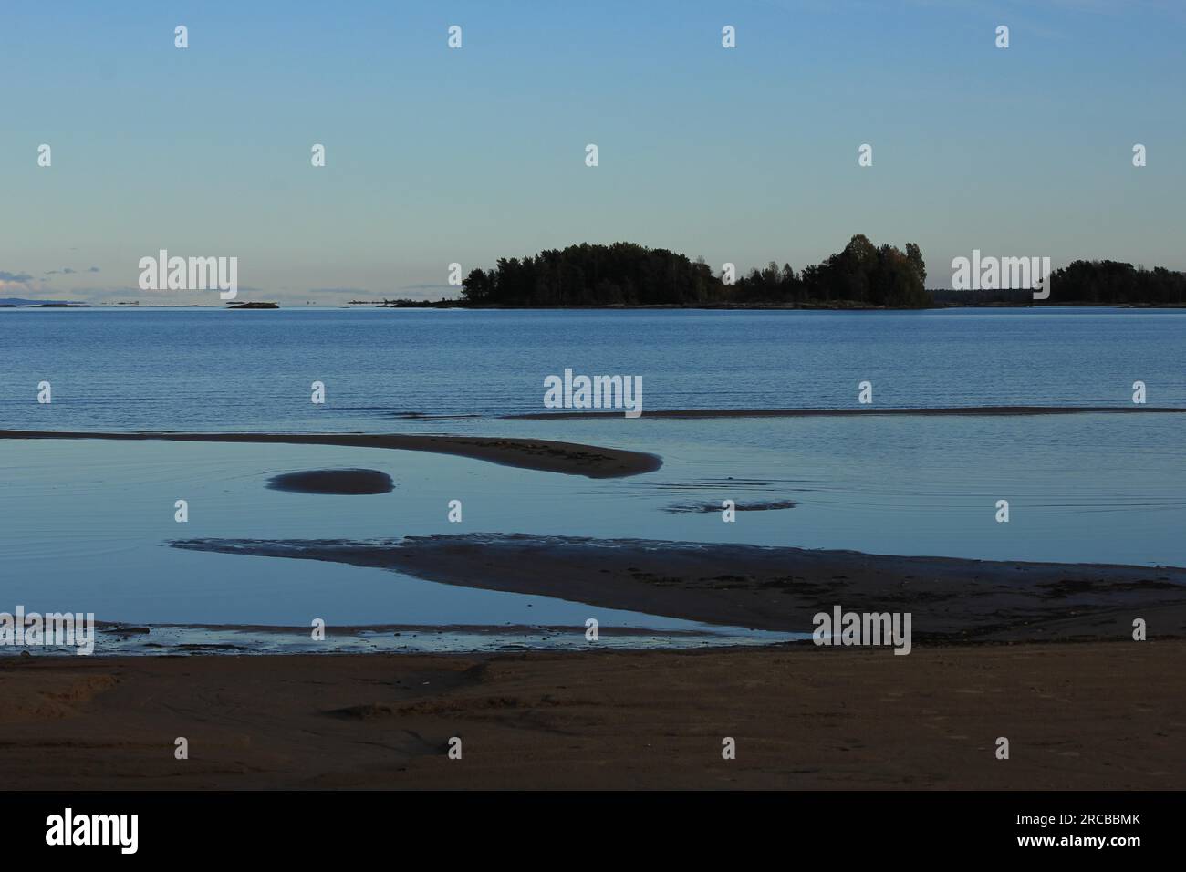 Natural shapes on a sand beach in Mellerud. Evening scene at Lake Vanern. Sweden Stock Photo