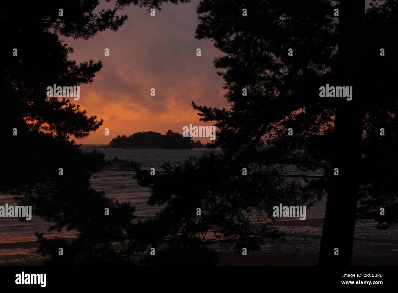 Sunrise view from Vita Sannar, Mellerud. Small island at the shore of Lake Vanern Stock Photo