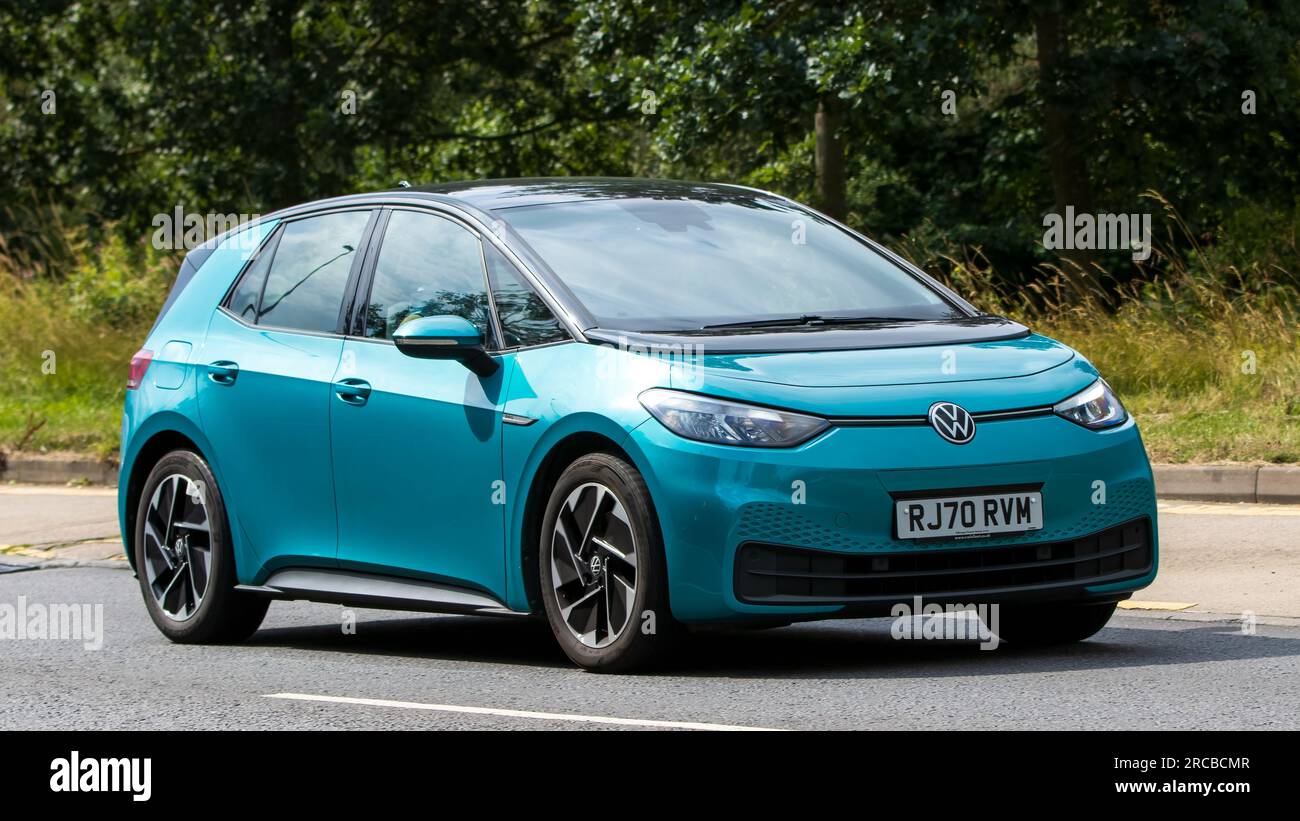 Milton Keynes,UK - July 13th 2023: 2020 turquoise electric VOLKSWAGEN ID3 LIFE car driving on an English road Stock Photo
