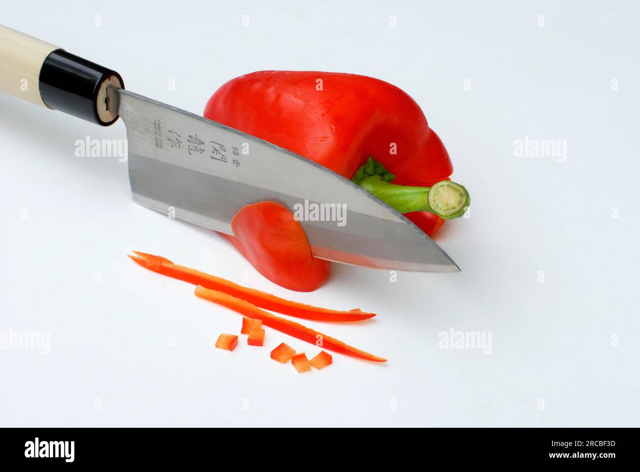 Japanese knife and paprika (Capsicum annuum Stock Photo Alamy