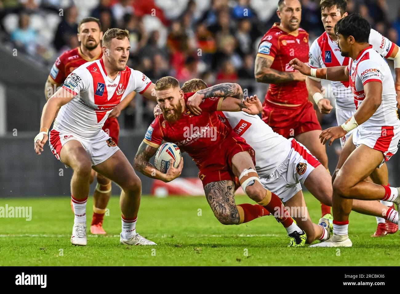Sam Tomkins #29 of Catalans Dragons is tackled by George Delaney #30 of St Helens during the Betfred Super League Round 19 match St Helens vs Catalans Dragons at Totally Wicked Stadium, St Helens, United Kingdom, 13th July 2023 (Photo by Craig Thomas/News Images) in, on 7/13/2023. (Photo by Craig Thomas/News Images/Sipa USA) Credit: Sipa USA/Alamy Live News Stock Photo