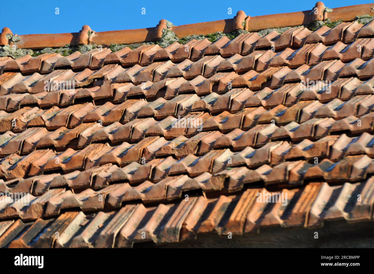 On the roof of the house is an old red ceramic tile Stock Photo - Alamy