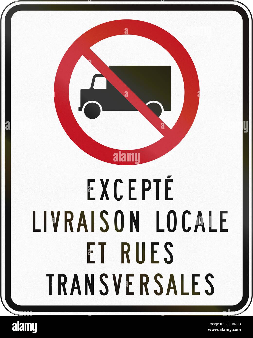 Canadian regulatory traffic sign No lorries. The text means Except