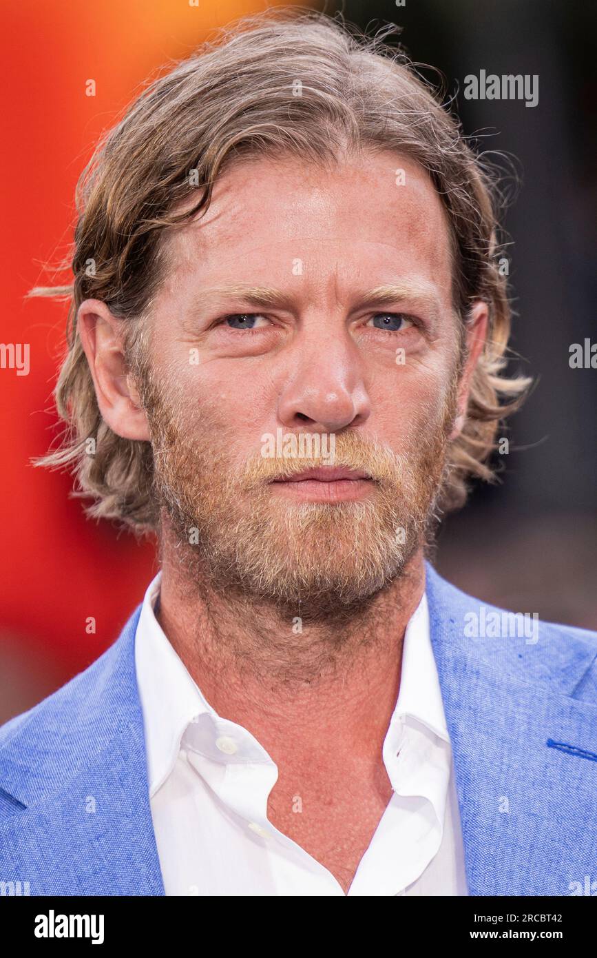 Jefferson Hall poses for photographers upon arrival at the premiere for