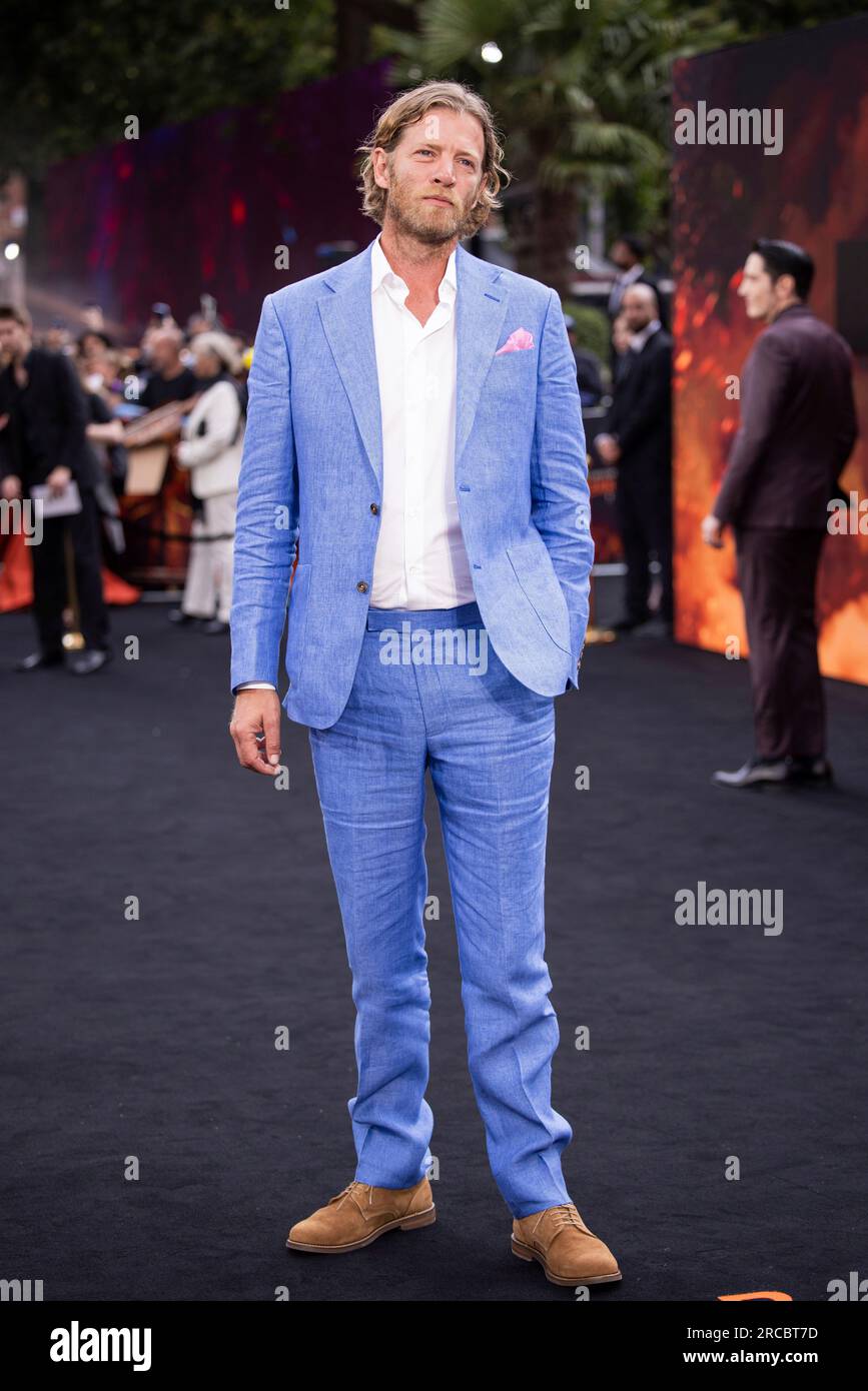 Jefferson Hall poses for photographers upon arrival at the premiere for