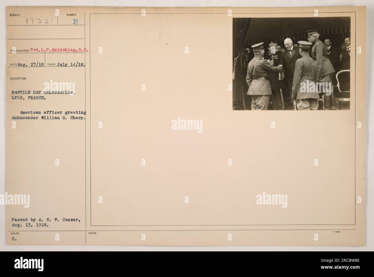 American officer greets Ambassador William G. Sharp during the Bastille Day celebrations in Lyon, France. The photograph was taken by Pvt. L.P. Goldshlag on July 14, 1918. It was released by the American Expeditionary Forces censor on August 13, 1918. (Caption complies with requested style) Stock Photo