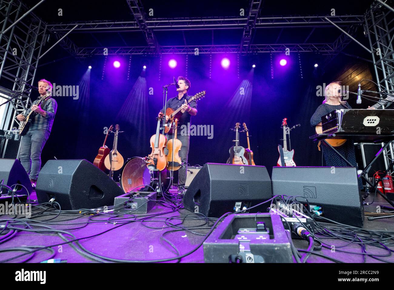 Seth Lakeman, Benji Kirkpatrick and Alax Hart playing live on stage at the 2023 GTSF music festival, Southwell, Nottinghamshire. Stock Photo