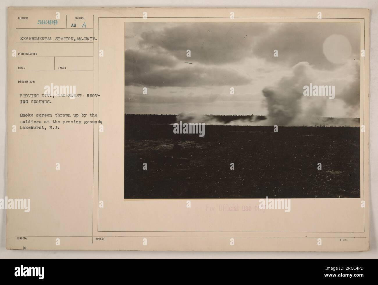 Soldiers at Lakehurst Proving Grounds in New Jersey create a smoke screen as part of an experiment during World War One. This image was taken by the photographer from the American University's Experimental Station. The smoke screen was used for official military purposes. Stock Photo