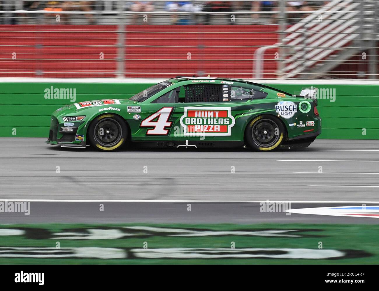 ATLANTA, GA - JULY 09: Kevin Harvick (#4 Stewart Haas Racing Hunt Brothers  Pizza Ford) and Ross Chastain (#1 Trackhouse Racing Worldwide Express  Chevrolet) race side by side the NASCAR Cup Series