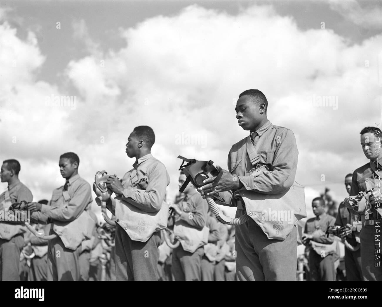Soldiers of Company J, 41st Engineers, in gas mask drill, Fort Bragg, North Carolina, USA, Arthur Rothstein, U.S. Office of War Information, March 1942 Stock Photo