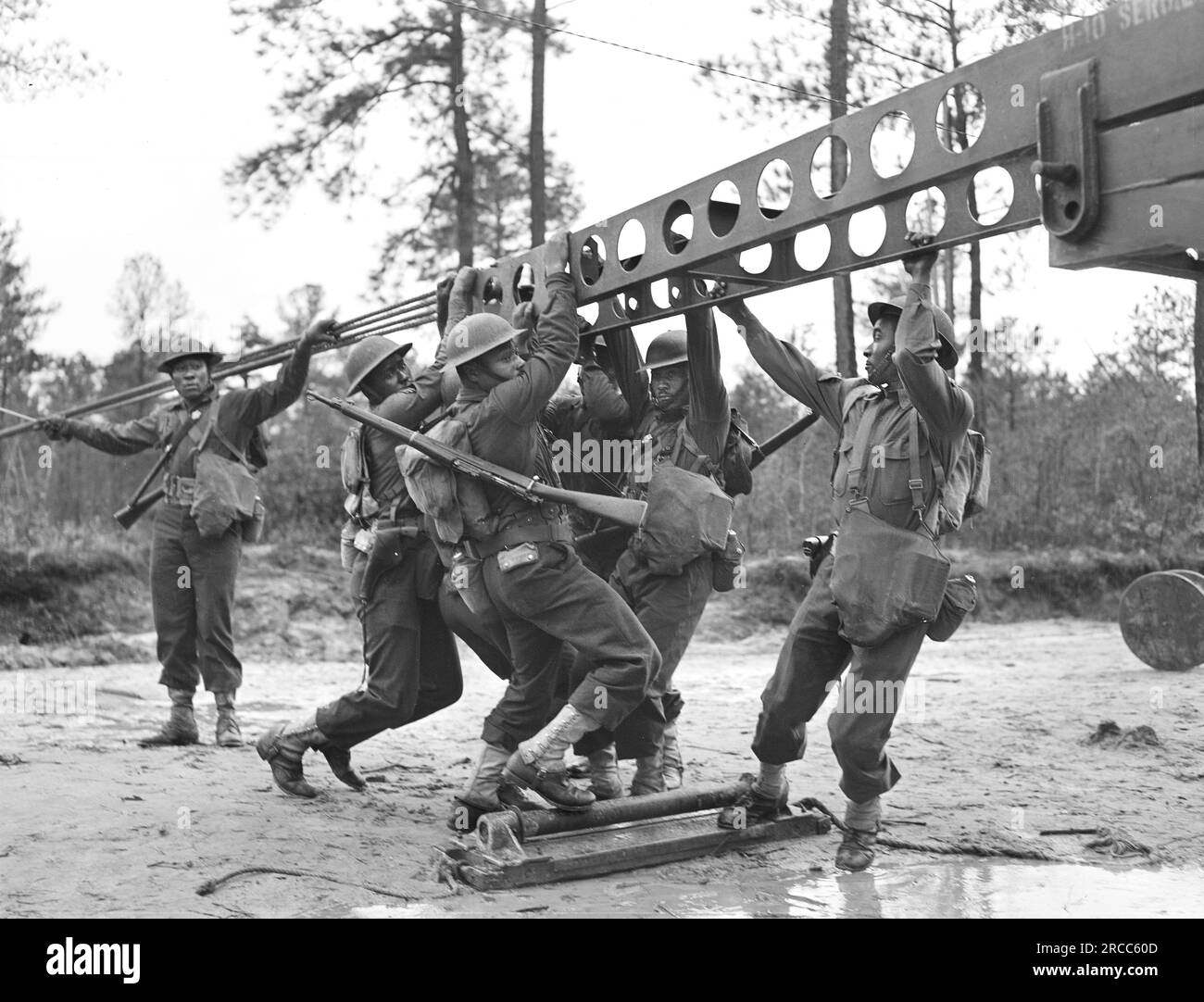 Soldiers of 41st Engineers building a bridge, Fort Bragg, North Carolina, USA, Arthur Rothstein, U.S. Office of War Information, March 1942 Stock Photo