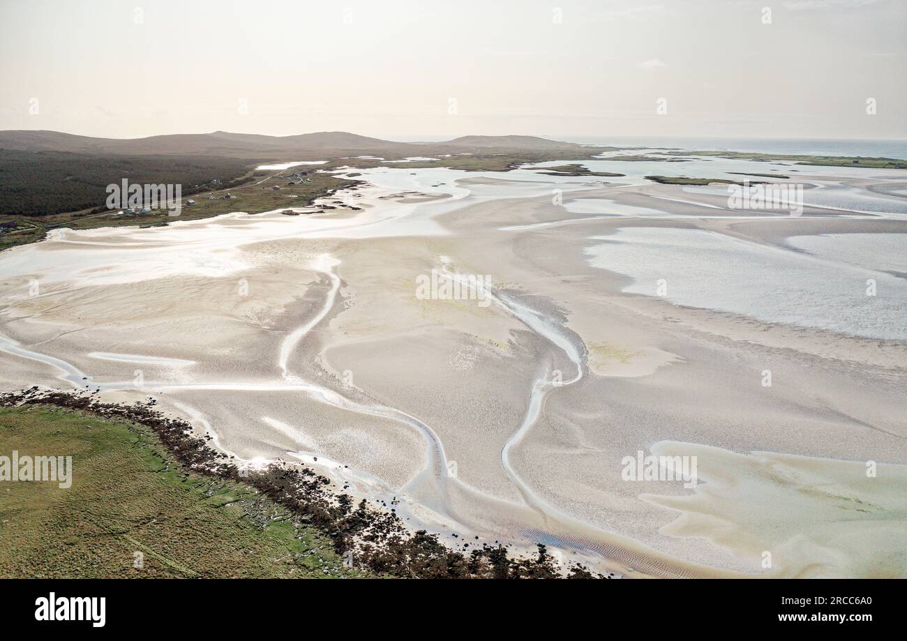 North Uist, Outer Hebrides. Coastal landscape looking west from Malacleit on islands west coast. White tidal sands of Traigh Bhalaigh, Vallay Beach Stock Photo