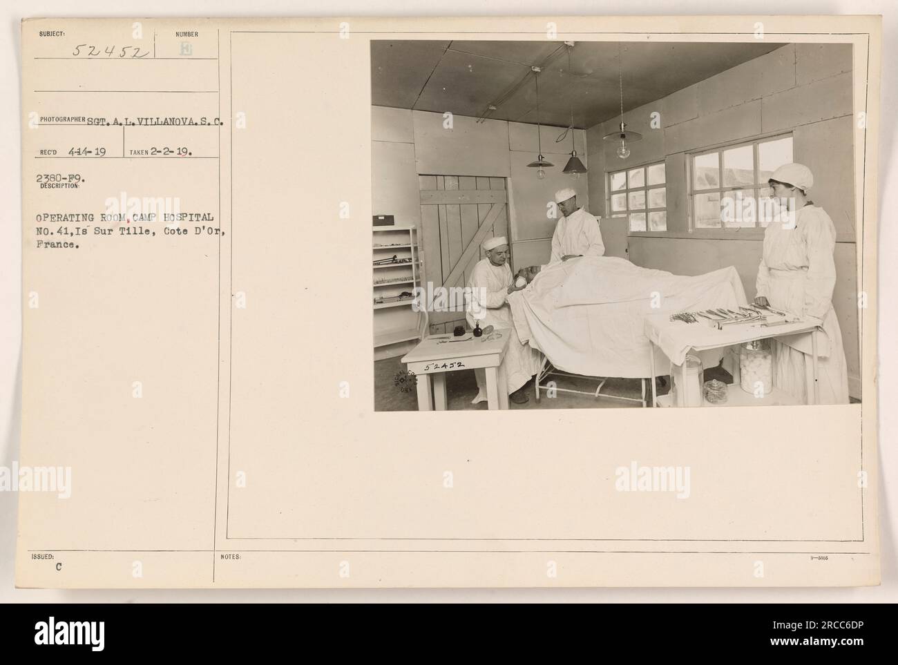 A photograph taken in 1919 shows the operating room at Camp Hospital No. 41 in Is Sur D'Or, France. The photo was taken by Sot. A. L. Villanova, and the description states that it is an issued operating room at the hospital. The accompanying notes reference the subject as 52452. Stock Photo
