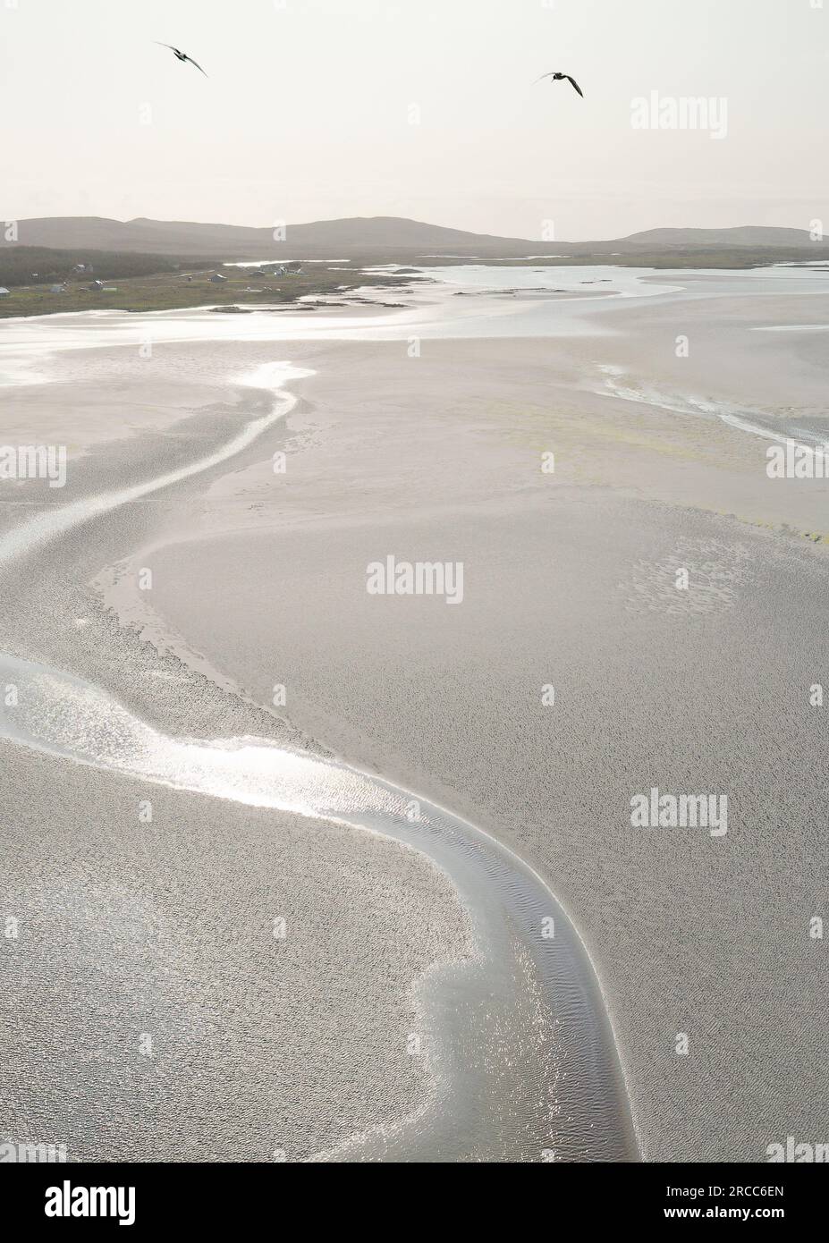 North Uist, Outer Hebrides. Coastal landscape looking west from Malacleit on islands west coast. White tidal sands of Traigh Bhalaigh, Vallay Beach Stock Photo