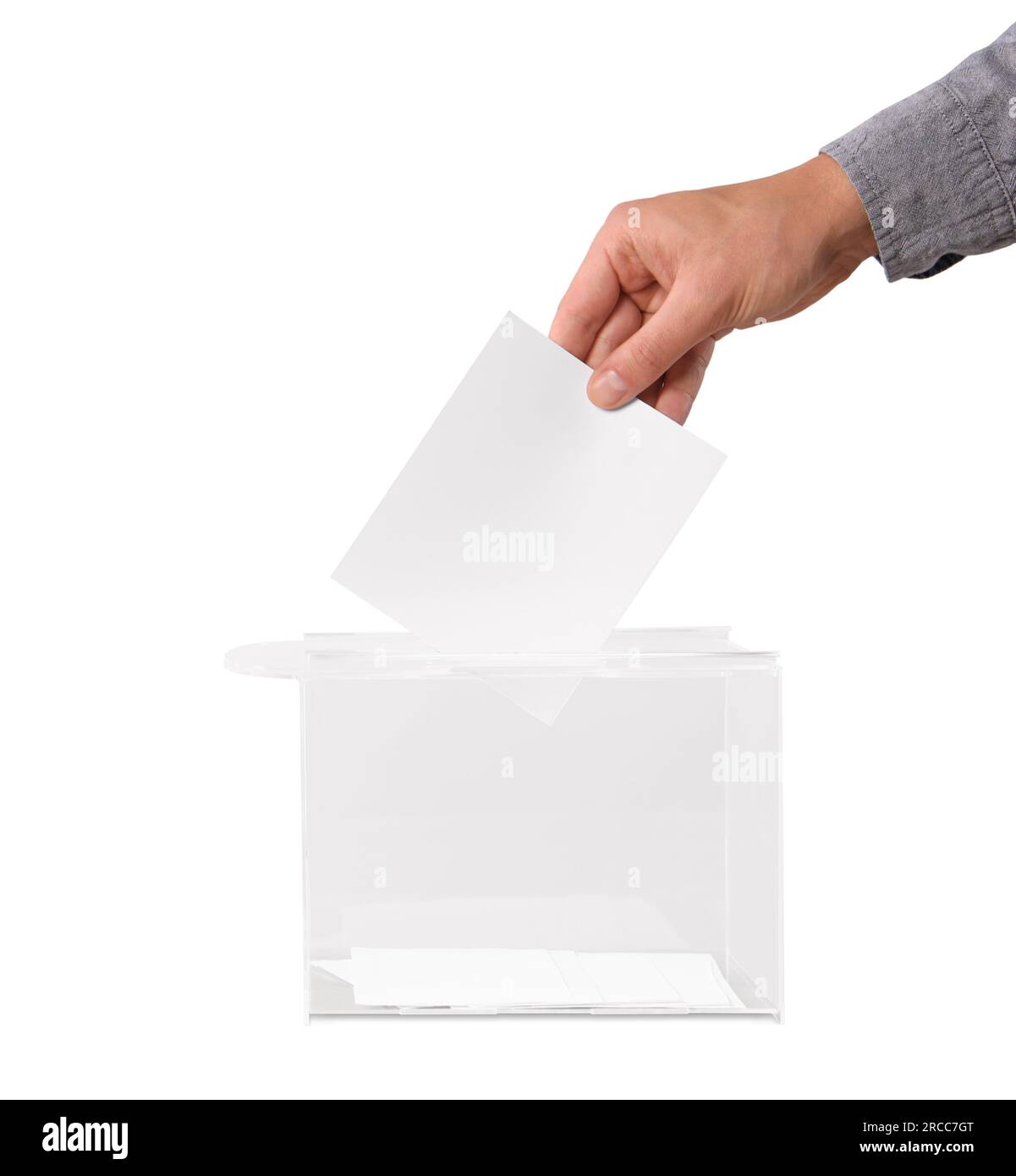 Man putting his vote into ballot box on white background, closeup Stock Photo