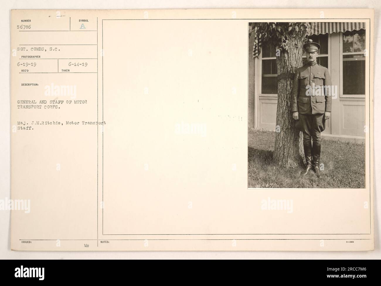 General and staff of Motor Transport Corps pose for a photograph. Major ...