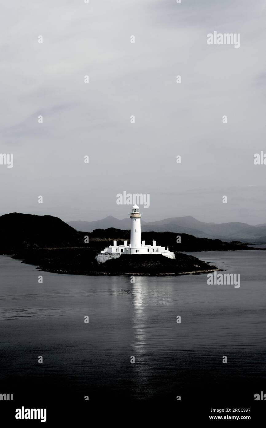 Lighthouse on Eilean Musdile at southern tip of island of Lismore in the Firth of Lorn, Argyll and Bute, western Scotland, UK Stock Photo