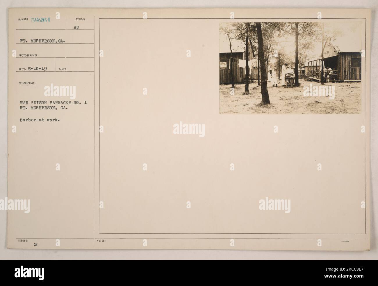 A barber at War Prison Barracks No. 1, located in Ft. McPherson