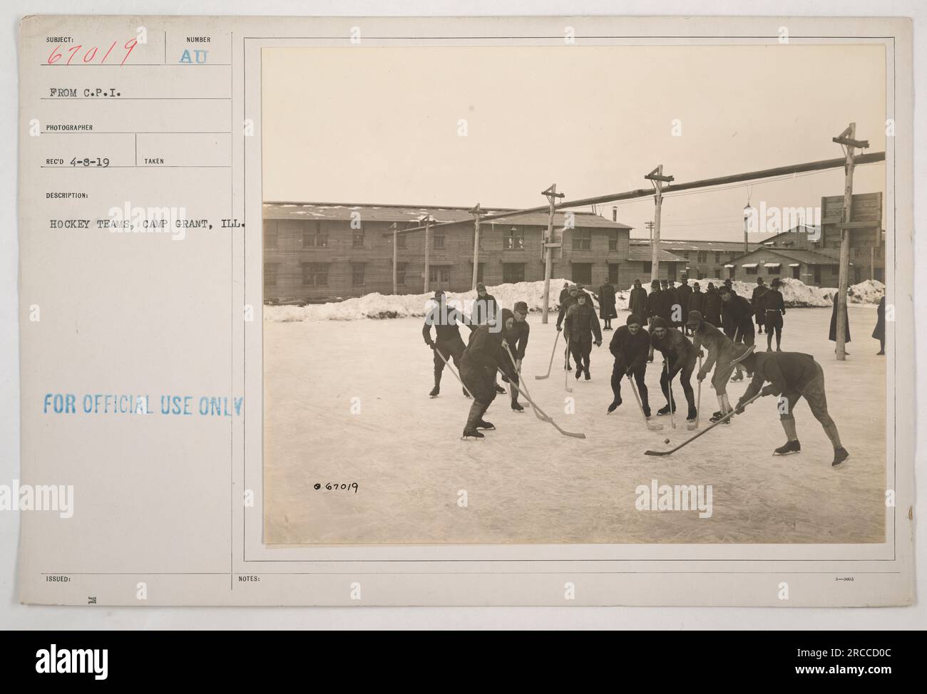 Hockey teams at Camp Grant, Illinois during World War I. The photograph was taken by a C.P.I. photographer and received on April 8, 1919. The image depicts the hockey teams, but no further details are provided in the description. The photograph is officially issued for use. Stock Photo