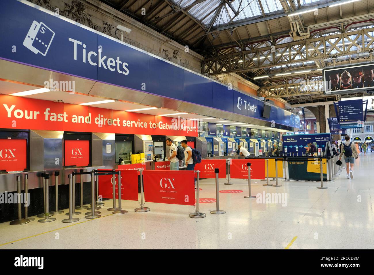 London, UK. Ticket counters inside Victoria Station for all overground services and for Gatwick Express. Stock Photo