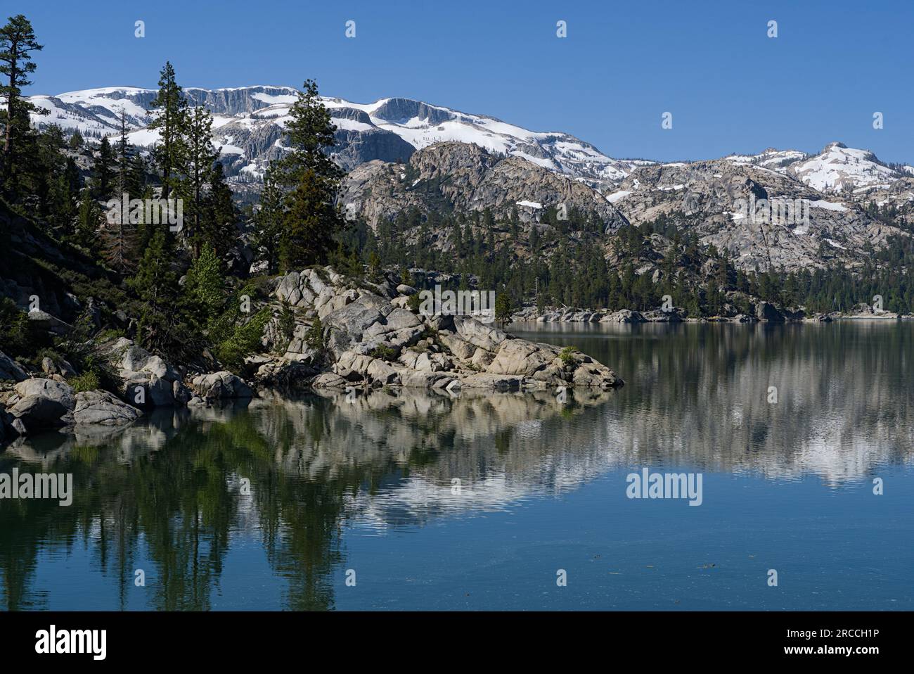 Alpine mountain and it's reflection in the alpine lake in Emigrant