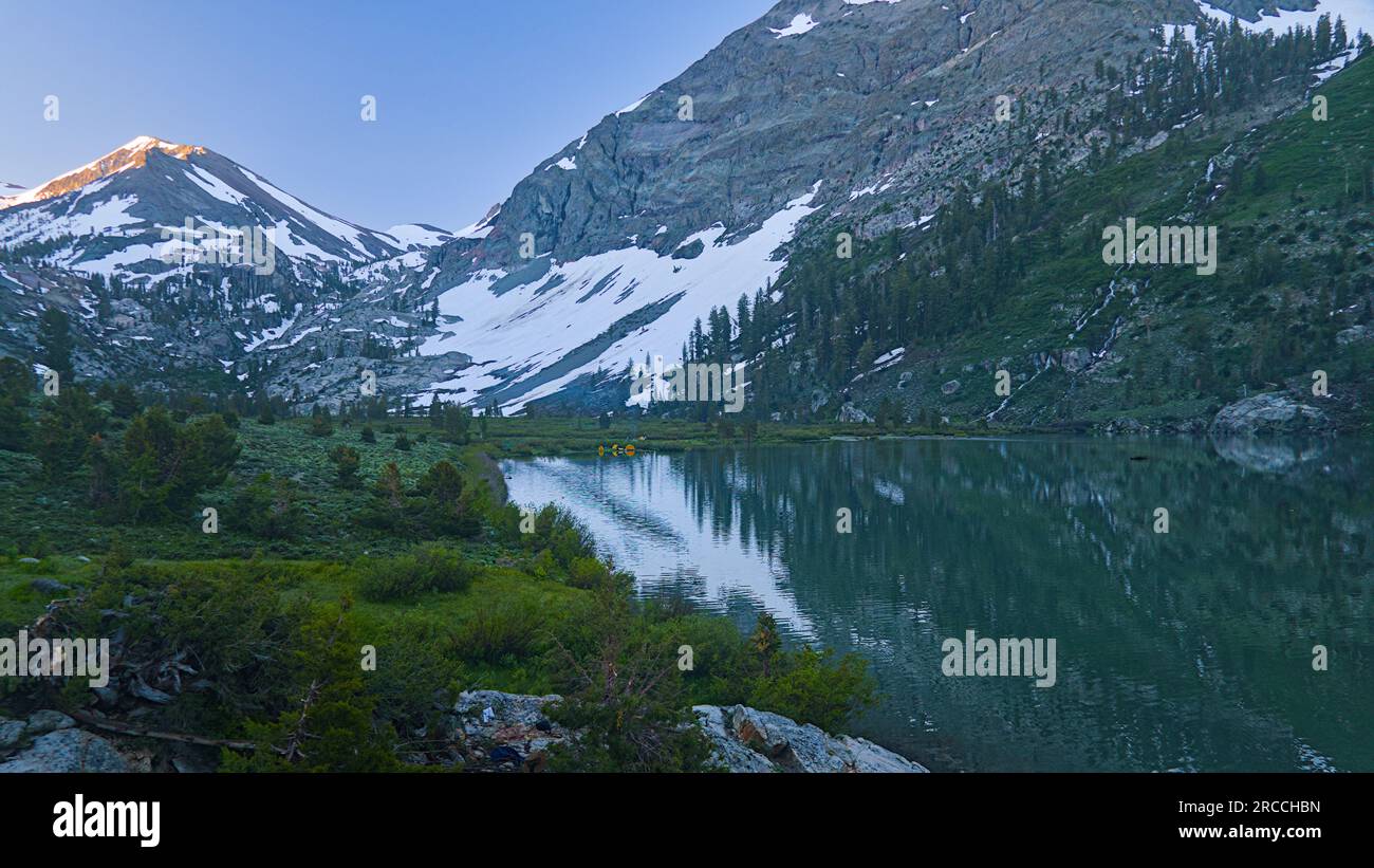 Alpine mountain and it's reflection in the alpine lake in Emigrant