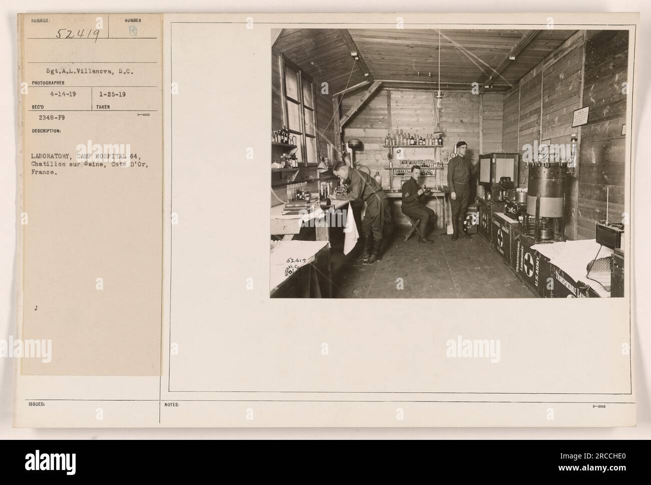 Camp Hospital 64 in Chatillon sur Seine, France, during World War One. The photograph shows a laboratory, where medical personnel are working. Taken by Sgt. A.L. Villanova on April 14, 1919. Notation number: 52419. Stock Photo