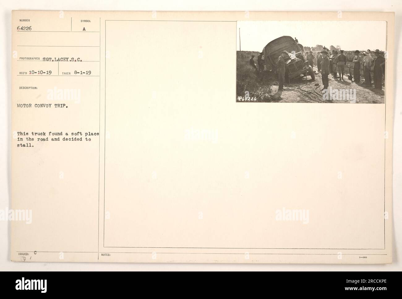 A truck from the motor convoy trip stalls after encountering a soft patch of road. Photographed on August 1, 1919 by Sergeant Lacey of the Signal Corps. Symbol issued: A-91-C. Note: 464226. Stock Photo