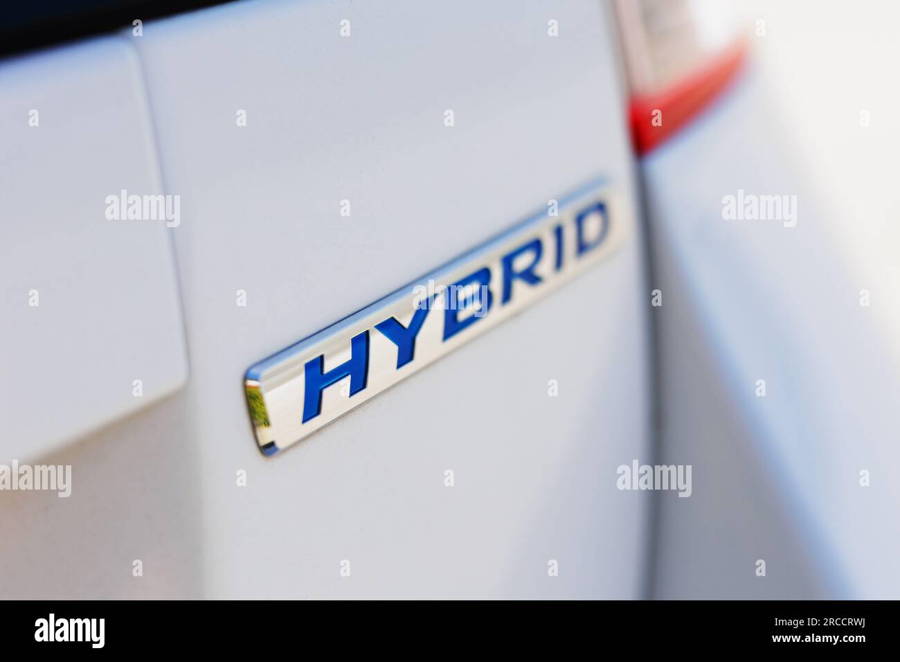 Close up view of a hybrid car logo Stock Photo