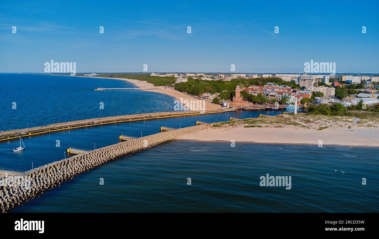 Drone view in the sunny day of lighthouse and harbor in Kolobrzeg, Poland. Stock Photo