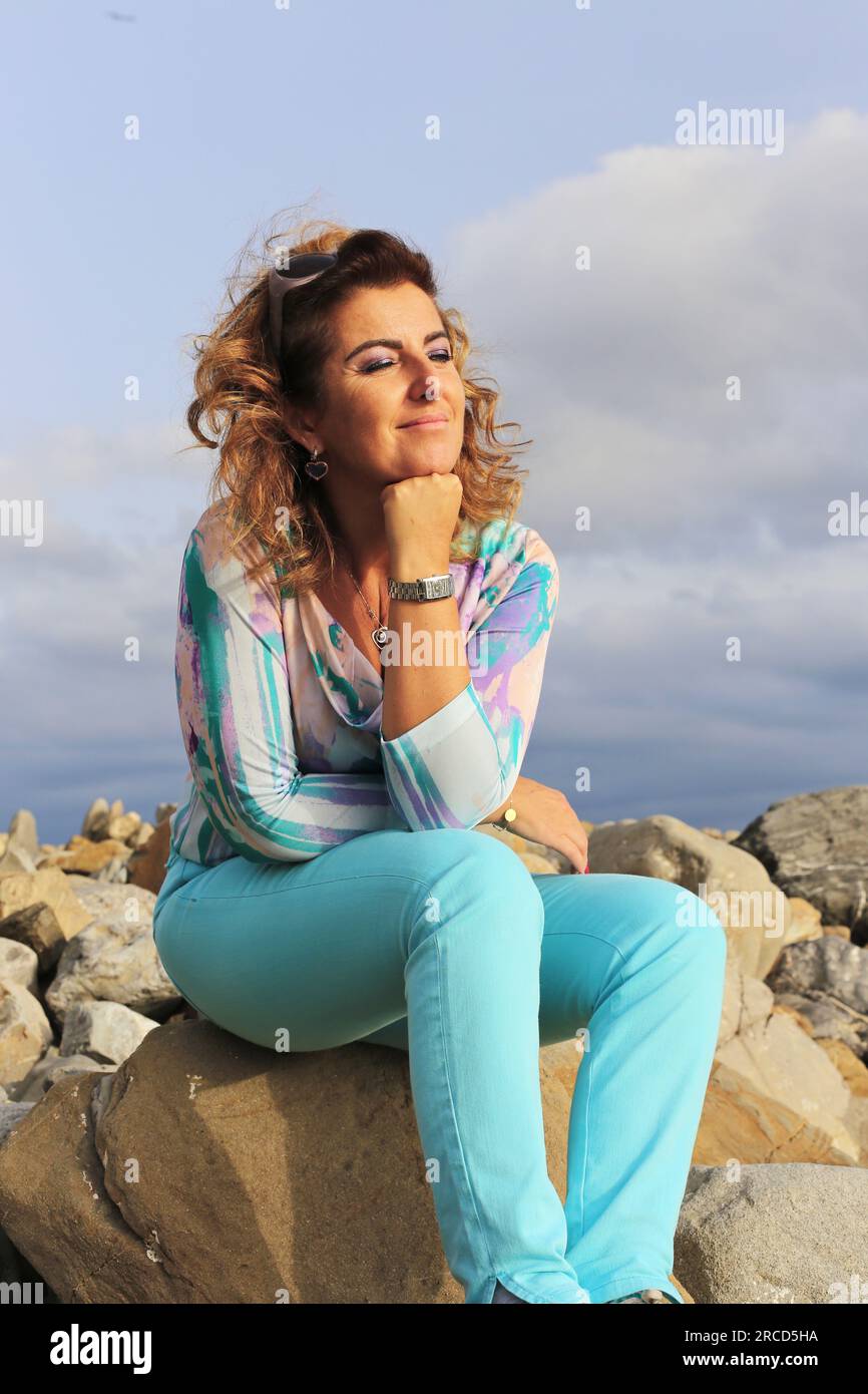 Portrait of senior woman on beach vacation trip Stock Photo