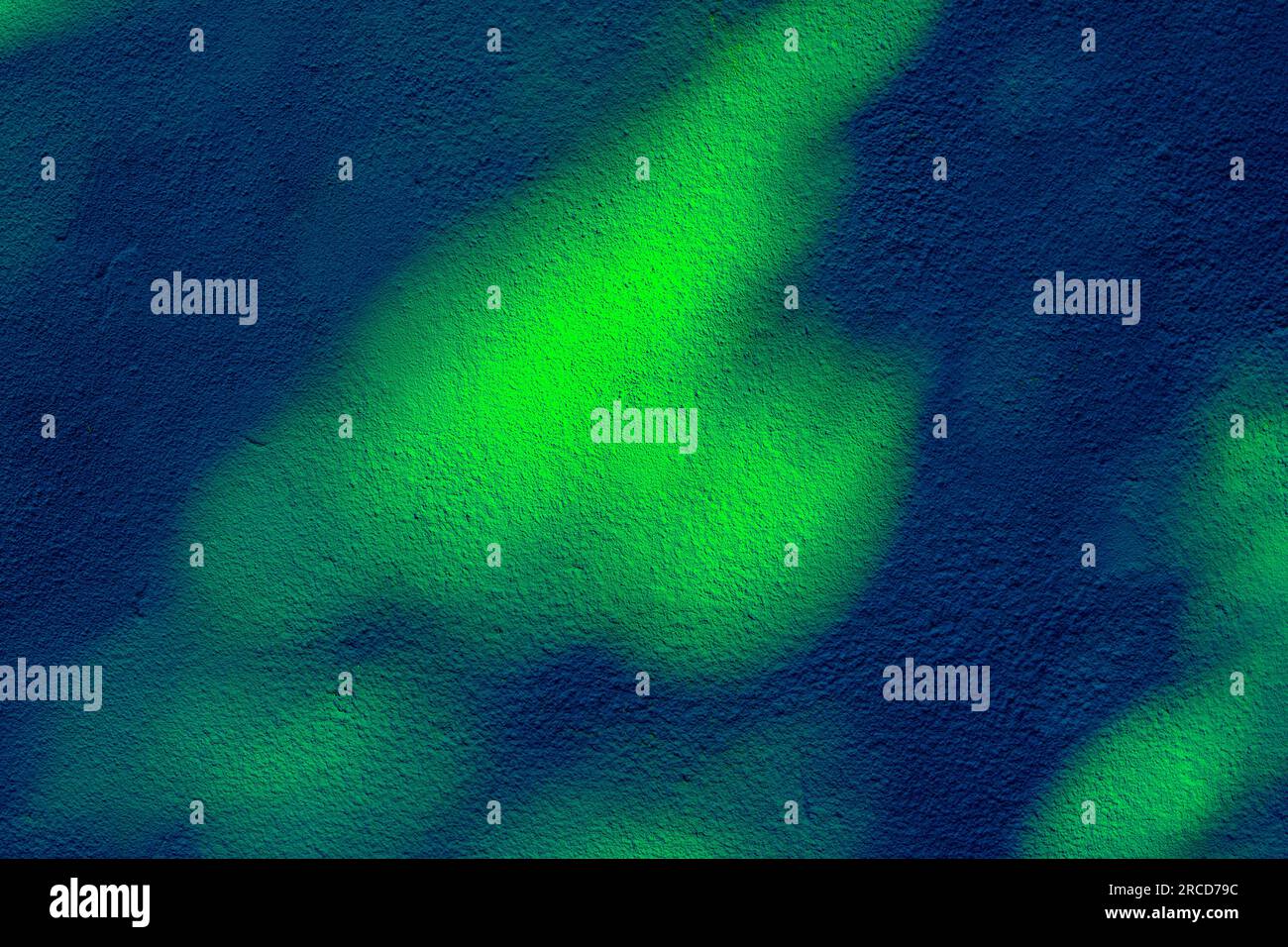 Blue and green pattern on plastered wall in closeup Stock Photo