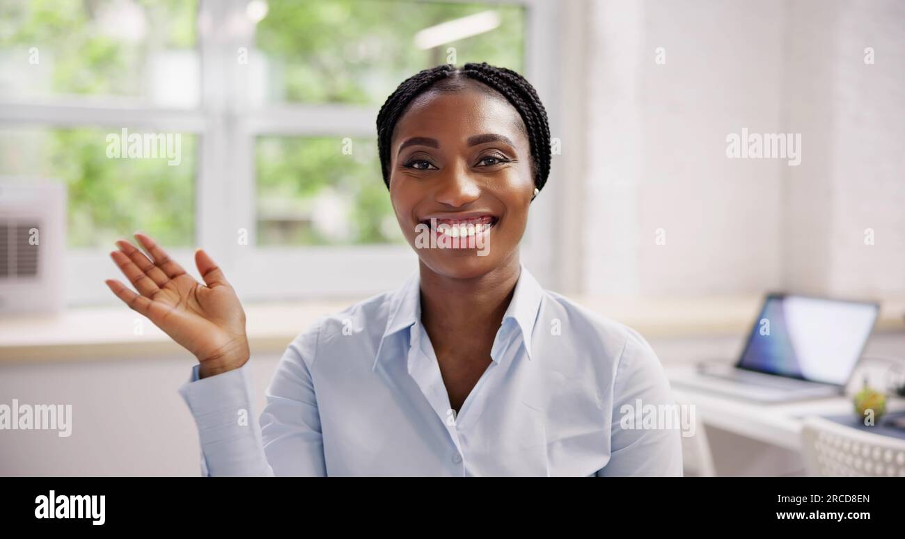 African american girl waving hand hi-res stock photography and images ...