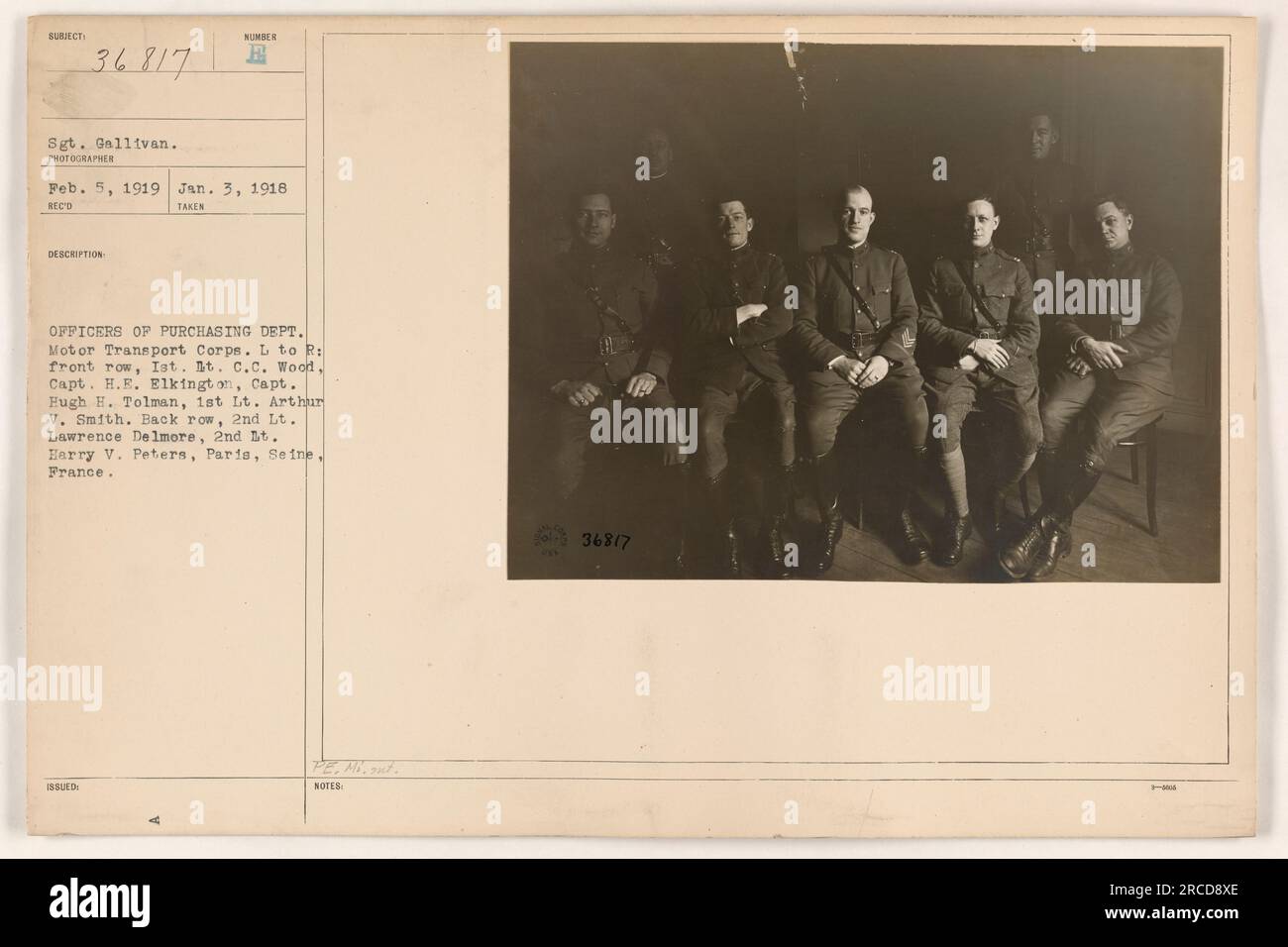 This photograph from February 5, 1919, shows a group of officers from the Motor Transport Corps of the American Military. In the front row, from left to right, are 1st Battalion C.C. Wood, Captain H.E. Elkington, Captain Hugh H. Tolman, and 1st Lieutenant Arthur V. Smith. In the back row, there are 2nd Lieutenant Lawrence Delmore and 2nd Lieutenant Harry V. Peters. The picture was taken in Paris, Seine, France. The identification number is 36817. Stock Photo