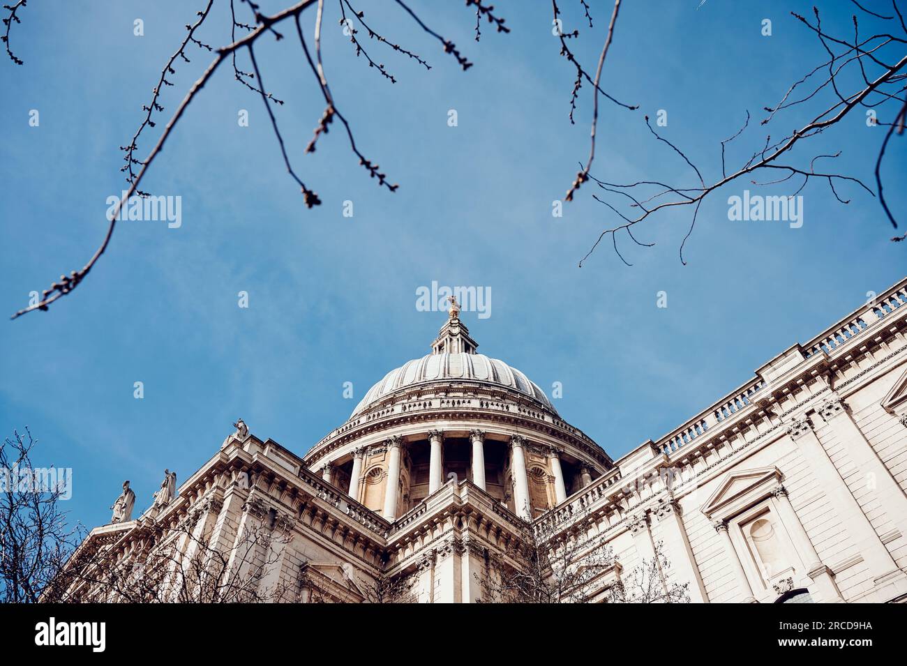 Dome of St Pauls Cathedral against blue sky Stock Photo