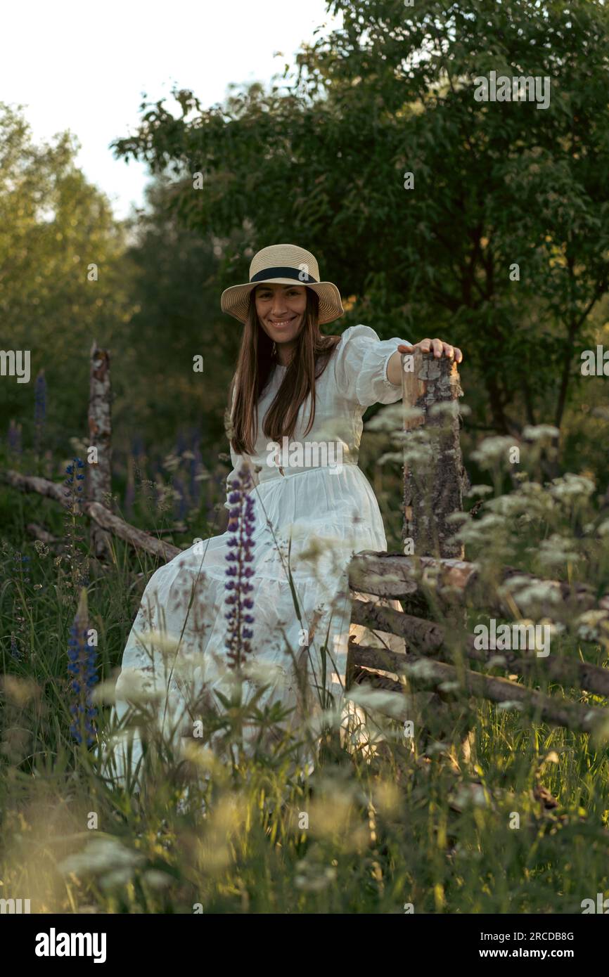 Rustic Woman Face Woman in a white dress and a hat in a rustic atmosphere Stock Photo - Alamy