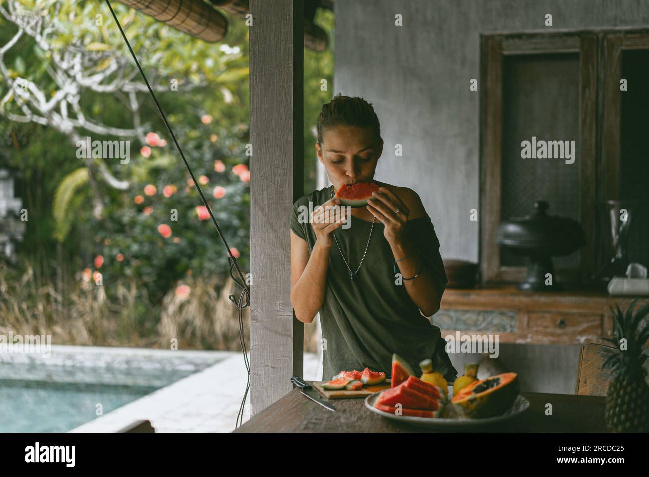 Female eats a ripe hi-res stock photography and images - Alamy