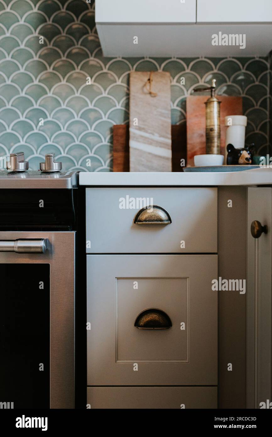 Kitchen cabinet interior design vintage brass pulls Stock Photo
