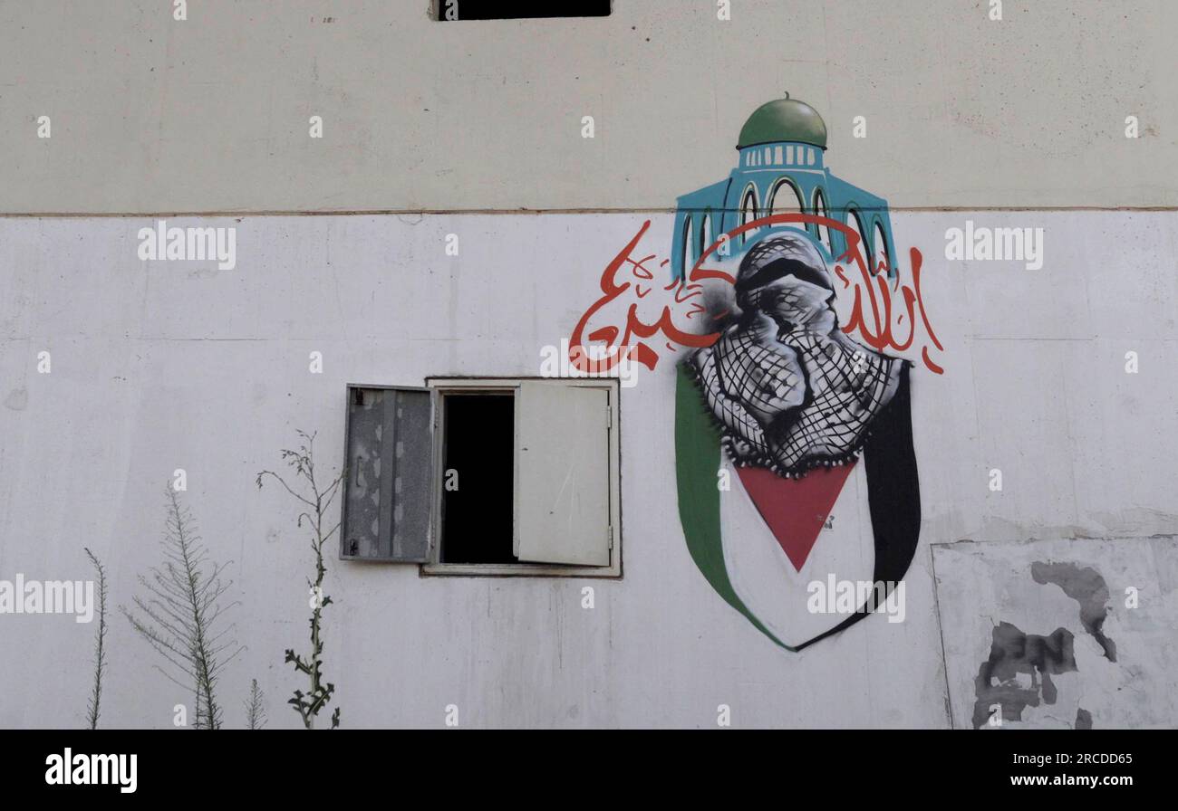 A graffiti of Hamas sits on display at the Tze'elim Urban Warfare ...