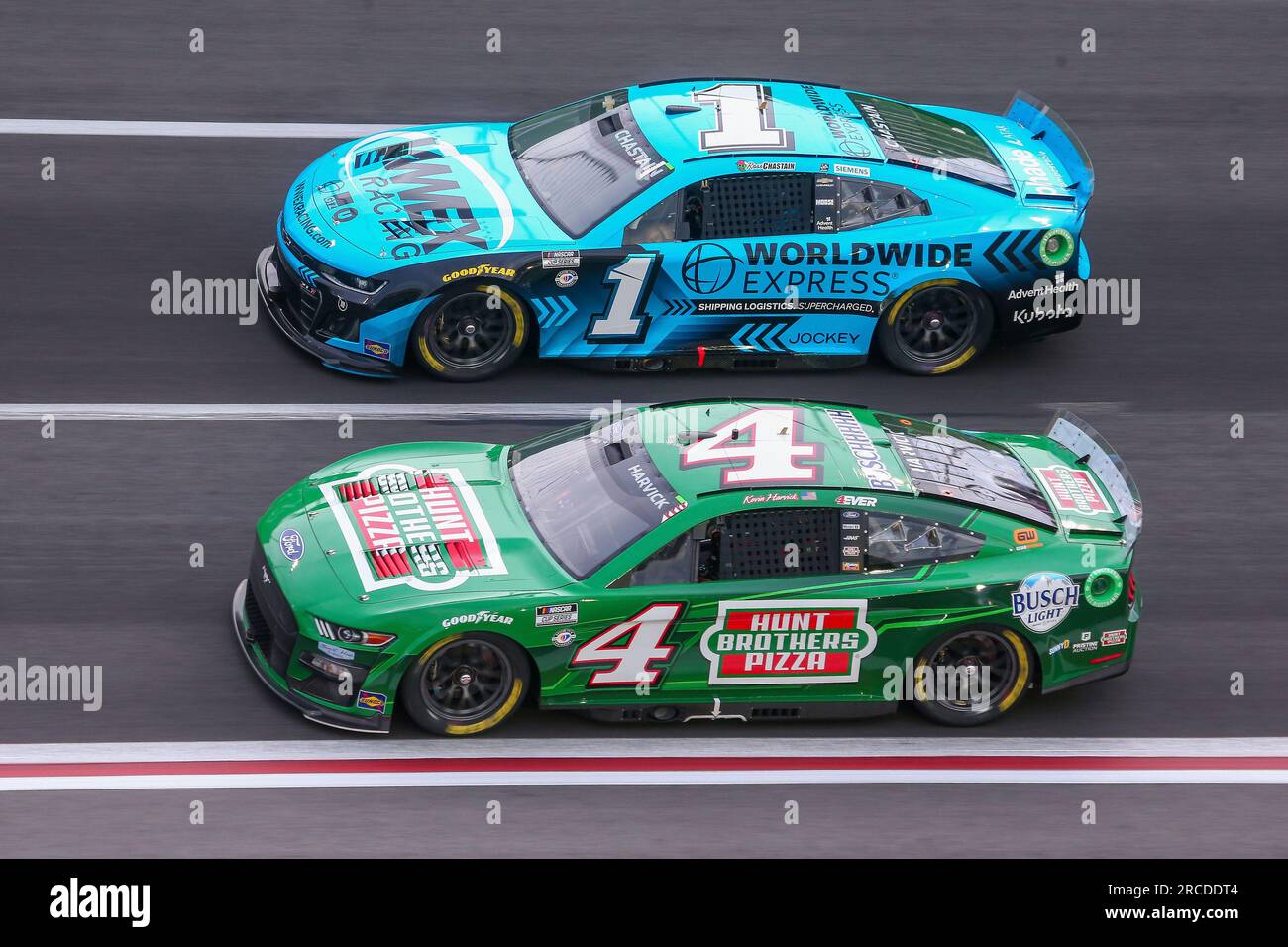 ATLANTA, GA - JULY 09: Kevin Harvick (#4 Stewart Haas Racing Hunt Brothers  Pizza Ford) and Ross Chastain (#1 Trackhouse Racing Worldwide Express  Chevrolet) race side by side the NASCAR Cup Series