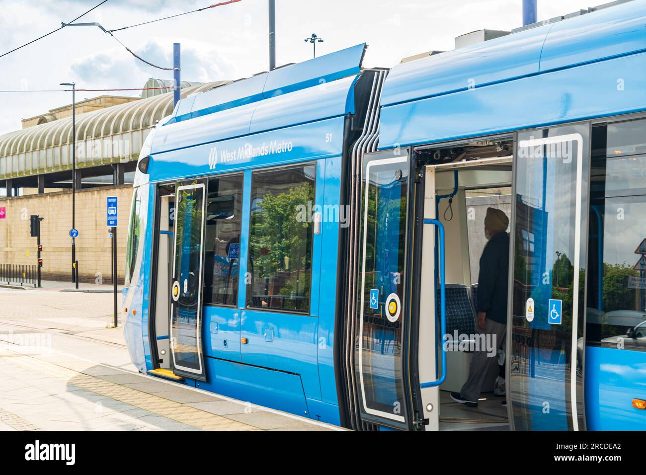 Wolverhampton, UK - July 13 2023: The West Midlands Metro waiting for passengers to board the tram at St Georges tram stop in Wolverhampton, UK Stock Photo