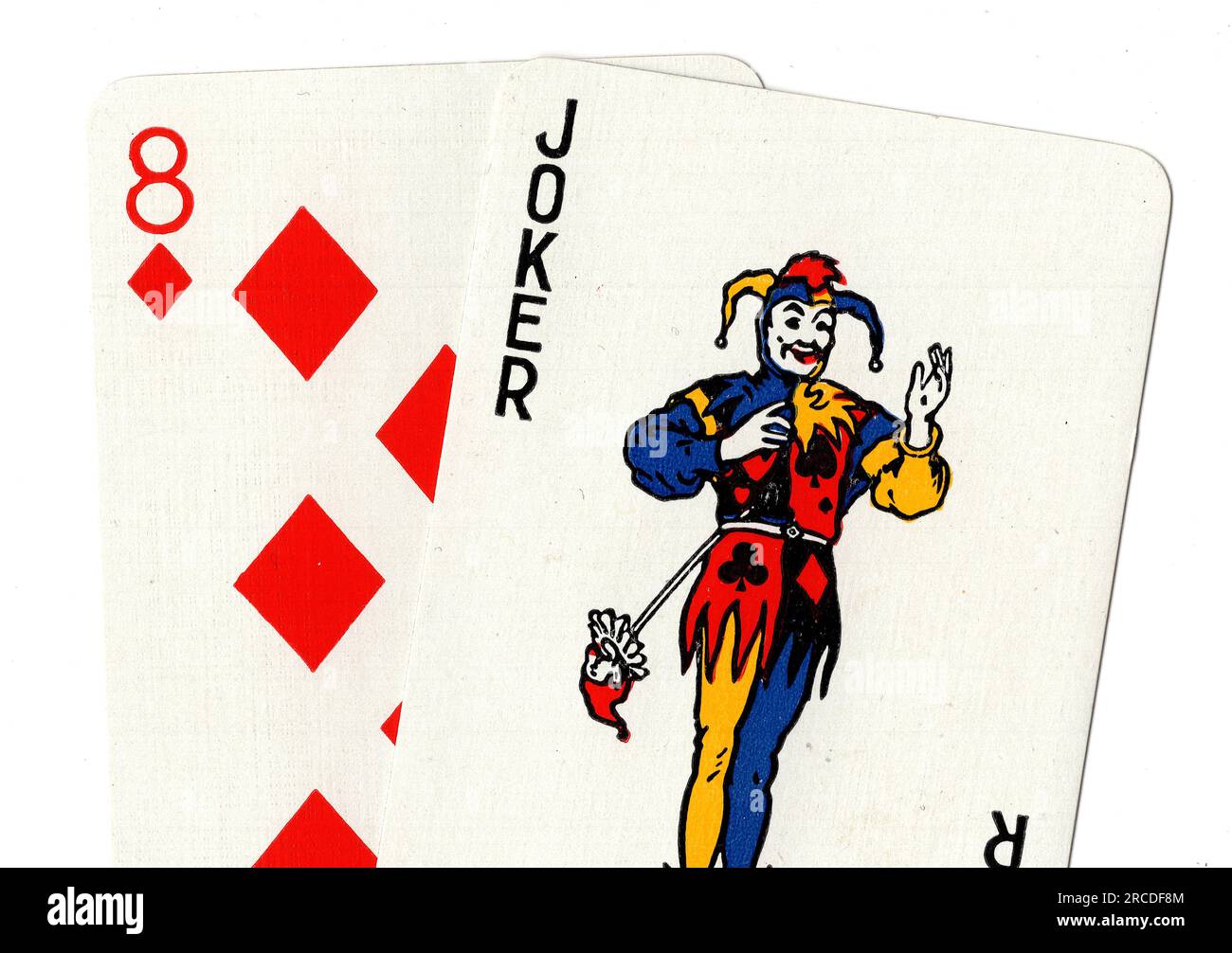 Vintage playing cards showing a joker and an eight of diamonds on a white background Stock Photo ...